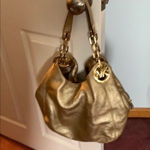 Michael Kors golden leather bag